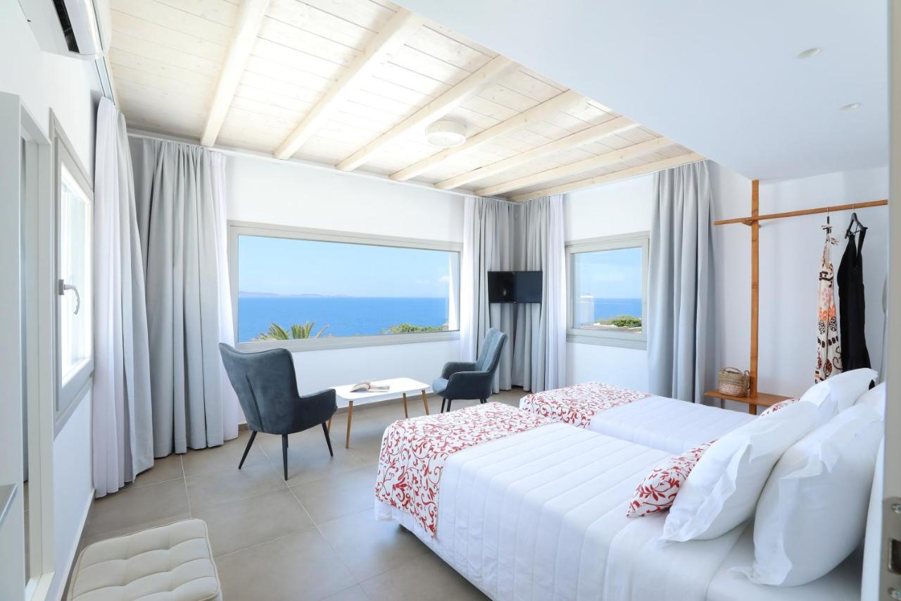 O Lofos Luxury Boutique Suites Agios Stefanos  Habitación foto
